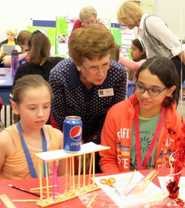 Makayla Hunter, 10, from Brentwood Elementary School and Sophia Rivera, 12, from Venice Christian School worked together successfully on an engineering project, “Tower Power”, where they built a straw tower that supported a soda can filled with rice. Carol Cudia, an AAUW member, coached them during their effort at the January 31 STEM Event sponsored by Venice-AAUW and the Frances T. Bourne Public Library.